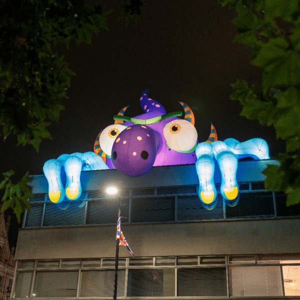 Monster Looking Over Building Cover